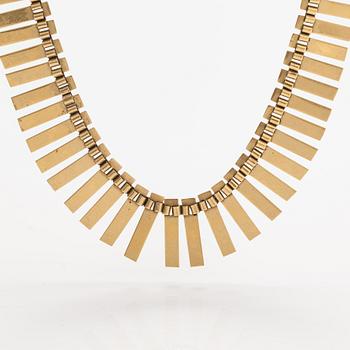 A 14K gold necklace. Import marked Koruteollisuus Tillander, Helsinki 1965.