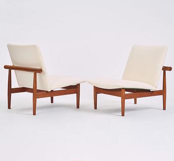 Finn Juhl, a pair of 'Japan' (FD-137) easy chairs and an ottoman, France & Son, Denmark, 1960s.