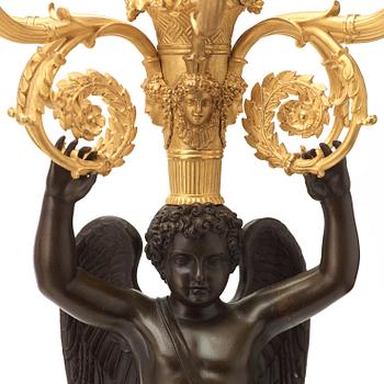 A large pair of French Chibout circa 1820 gilt and patinated bronze six-light candelabra.