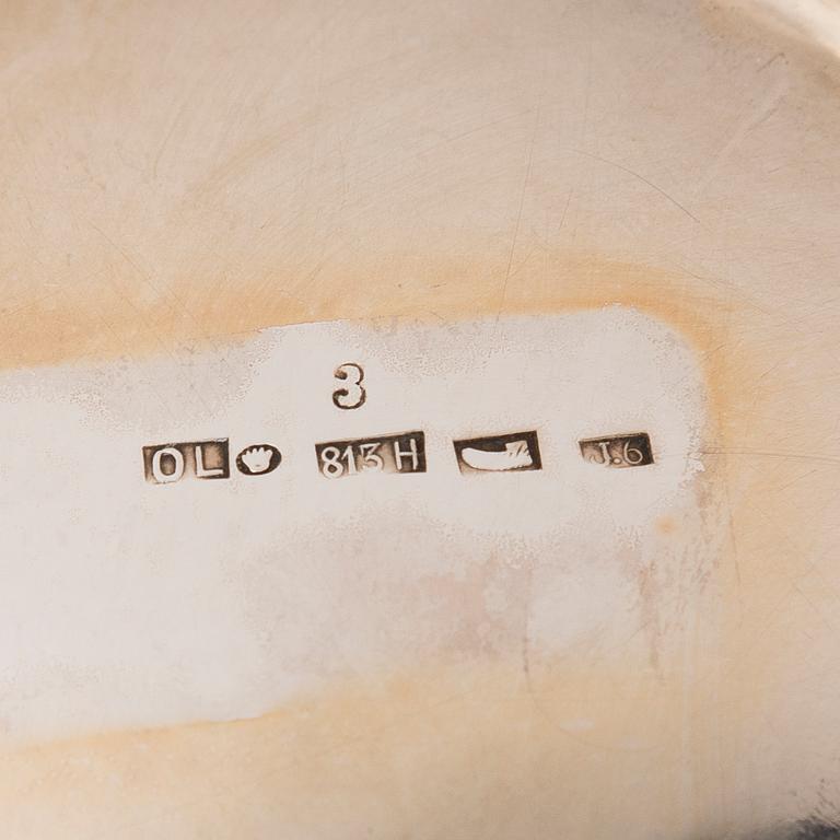 A silver sugar tong and a 3-piece silver coffee set, mark of Juho H. Pekuri, Oulu 1931 and Finnish import marks 1938.