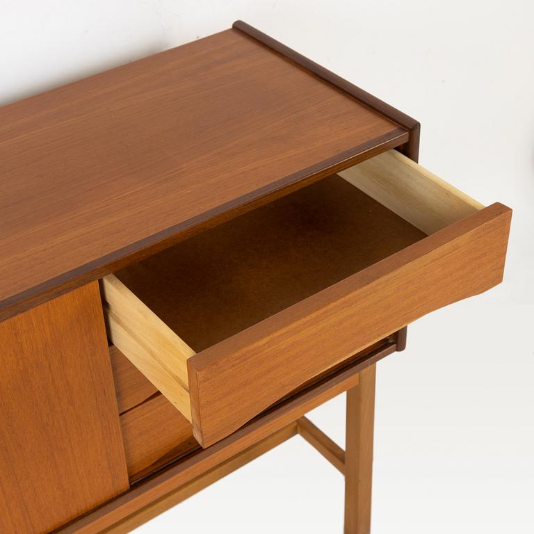 A teak dresser and mirror, 1960s.