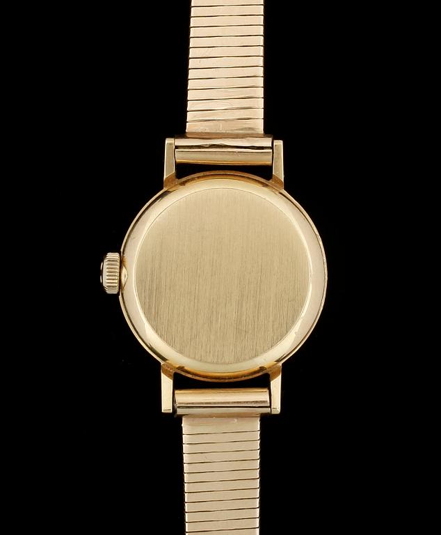 DAMARMBANDSUR, 18 k guld, Omega. omkr 1900-talets mitt. Total vikt ca 24 gram.