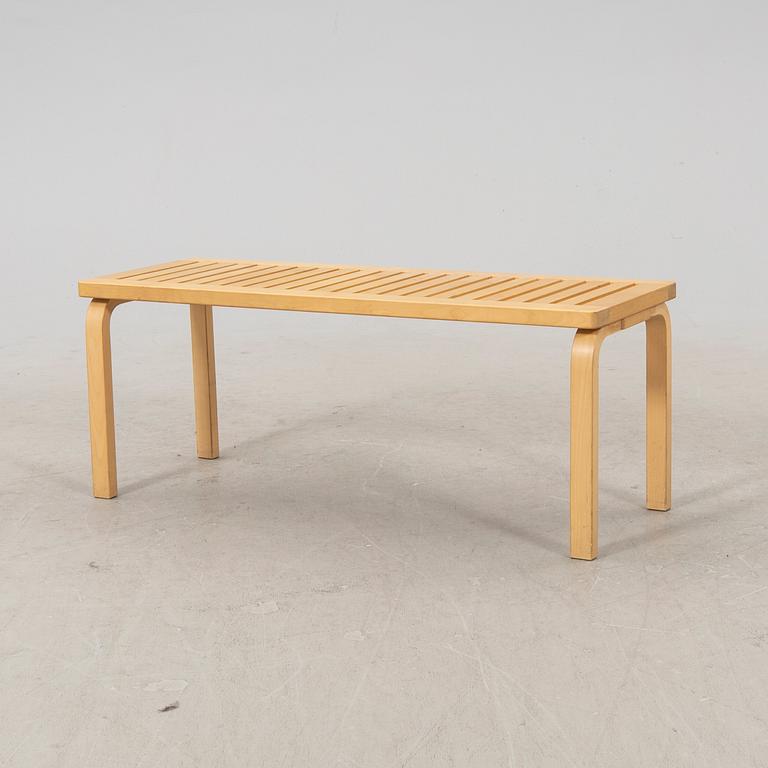 A model 153 birch bench by Alvar Aalto for Artek Finland.