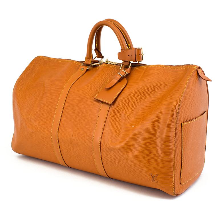 A BROWN EPI LEATHER KEEPALL 50 TRAVEL BAG.