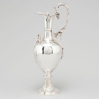 An English 19th century silver wine-jug, mark of Joseph Angle, London 1860.