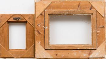 TWO WOODEN FRAMES.