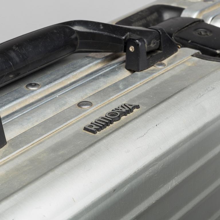 A set of three Rimowa bags later part of the 20th century.
