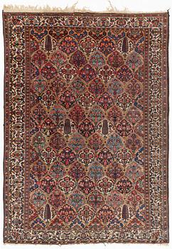 An antique/semi-antique Bakthiari carpet, c 298 x 213 cm.