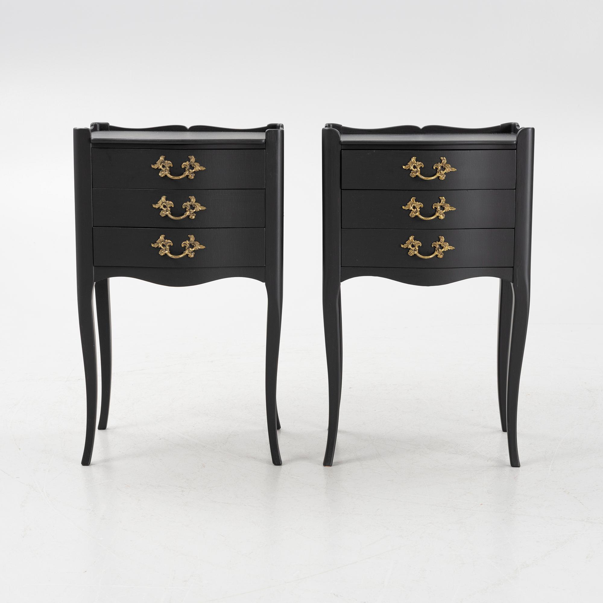 A pair of Rococo style bedside tables, second half of the 20th Century.