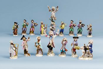 1241. A part monkey orchestra, comprising three 19th Century Meissen figures, the others with Meissen like mark. (17).
