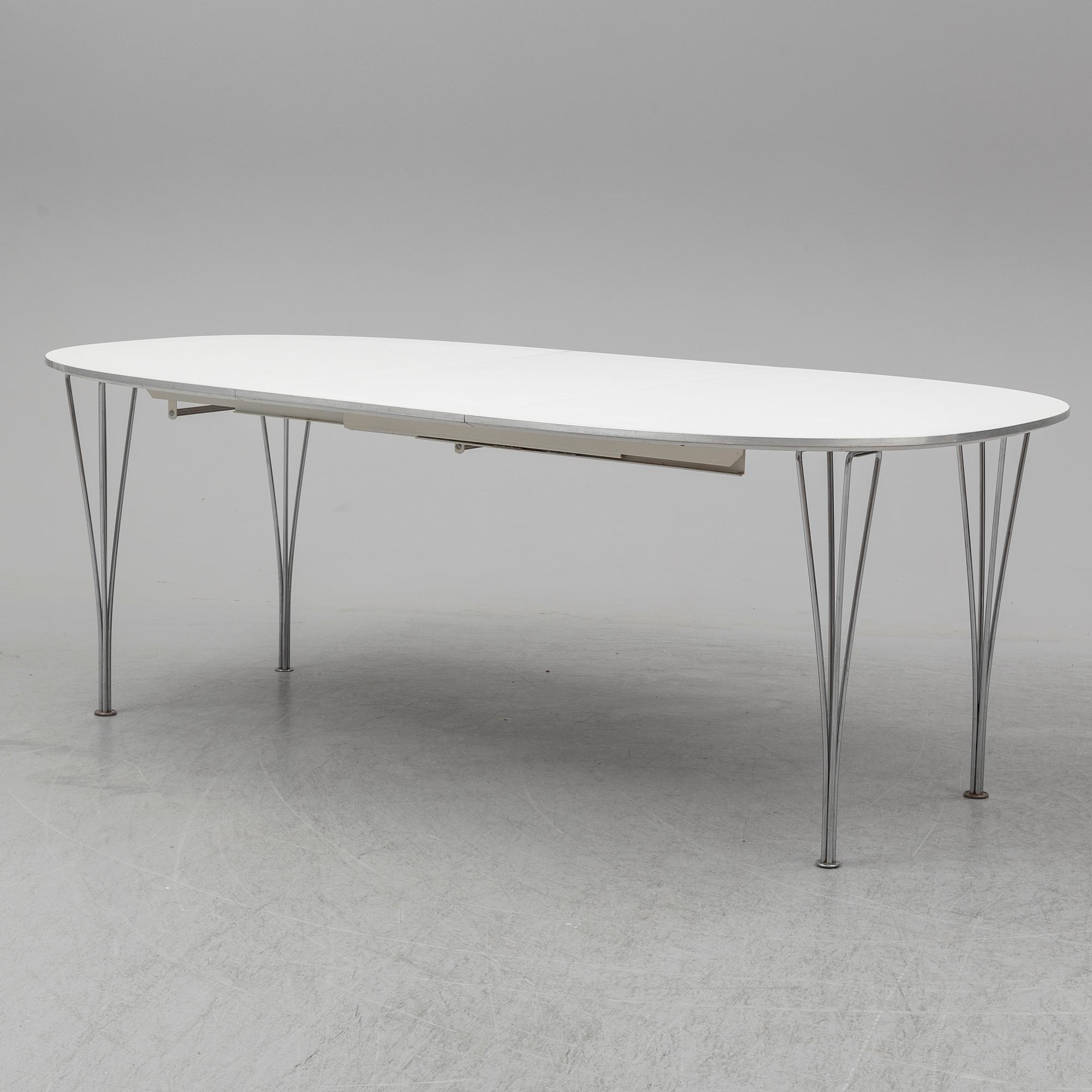 PIET HEIN & BRUNO MATHSSON, a 'Superellips' dining table, Fritz Hansen, Denmark.