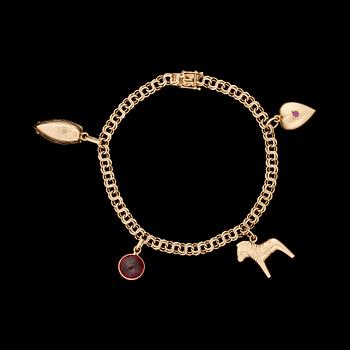 ARMBAND, 18k guld med berlocker. Göteborg 1953. Total vikt ca 10 g.