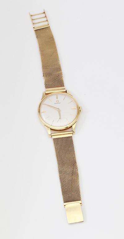 ARMBANDSUR, 18K guld, Omega. Total vikt inklusive urhus ca 65 g.