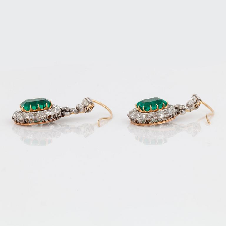 A pair of old cut diamond and emerald (minor oil) earrings. Certificate from SSEF.