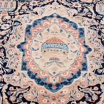 An oriental carpet, circa 387 x 301 cm.
