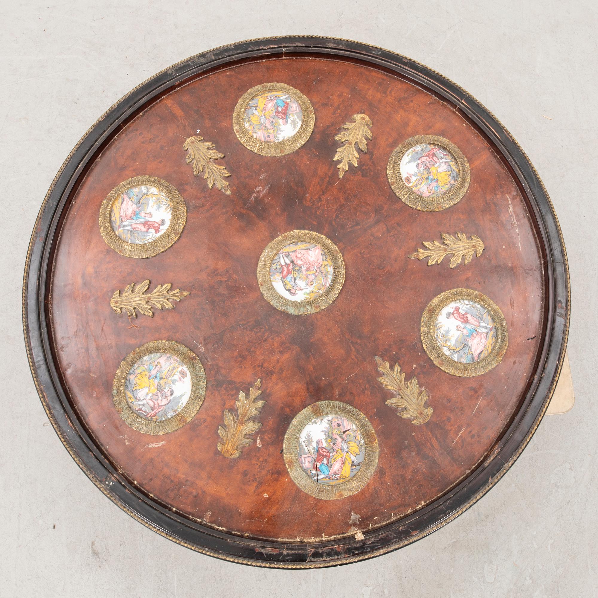 A walnut Empire style coffee table 20th century.