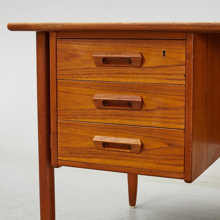 A 1950/60's teak writing desk.