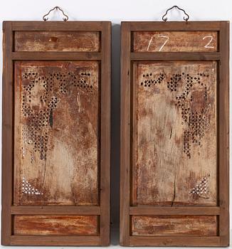 A pair of Chinese screen doors, late 19th century.