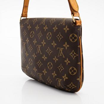 Louis Vuitton, a 'Musette Tango' bag.