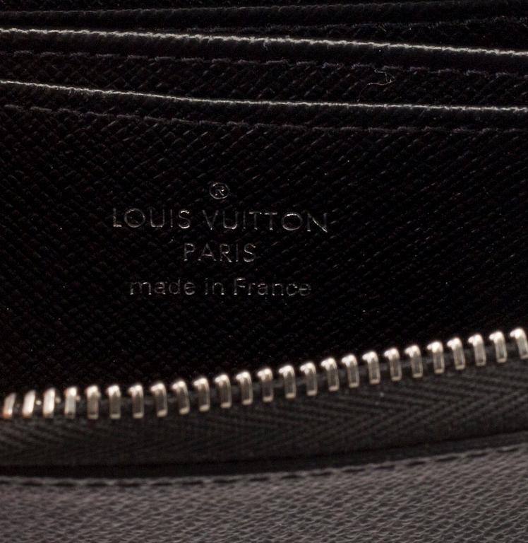 COIN PURSE, "ZIPPY COIN PURSE VERTICAL" Louis Vuitton.