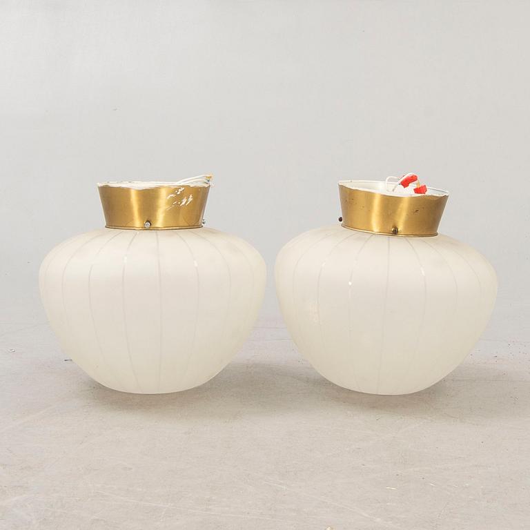 A pair of 1940/50s wall/ceiling lamps.