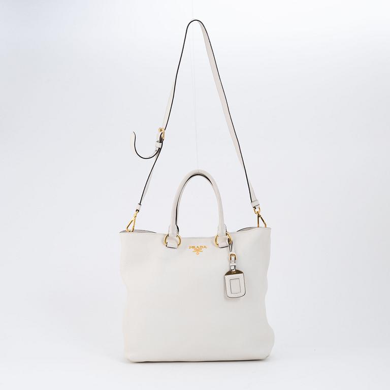 Prada, a white leather handbag.