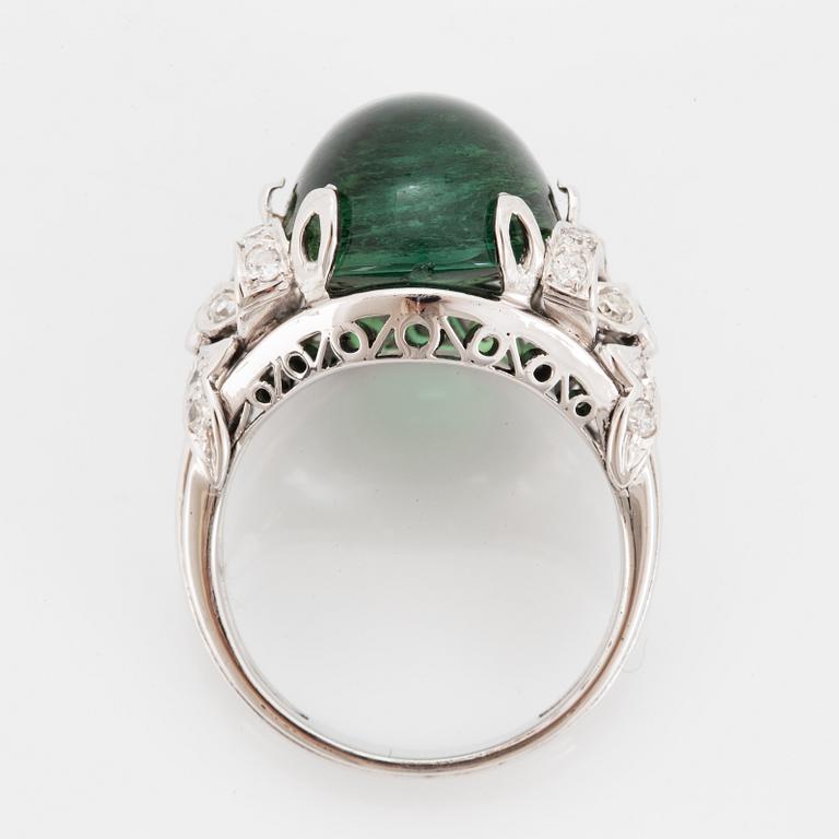 18K white gold diamond and green cabochon-cut tourmaline cocktail ring.