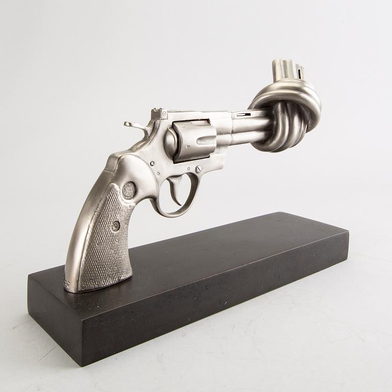 Carl-Fredrik Reuterswärd/ The Non-Violence Project Foundation, a signed and numbered sculpture 55/150 in humanium metal.