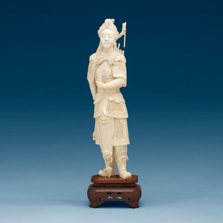 A carved ivory figure of a soldier in arms, late Qing dynasty, circa 1900.