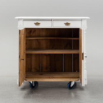 A painted sideboard, circa 1900.