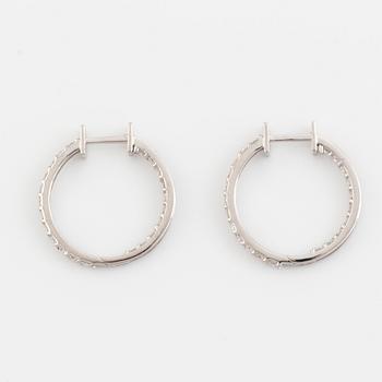 Brilliant cut diamond hoop earrings.