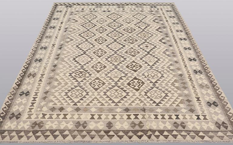 A Kelim carpet, 295 x 200 cm.