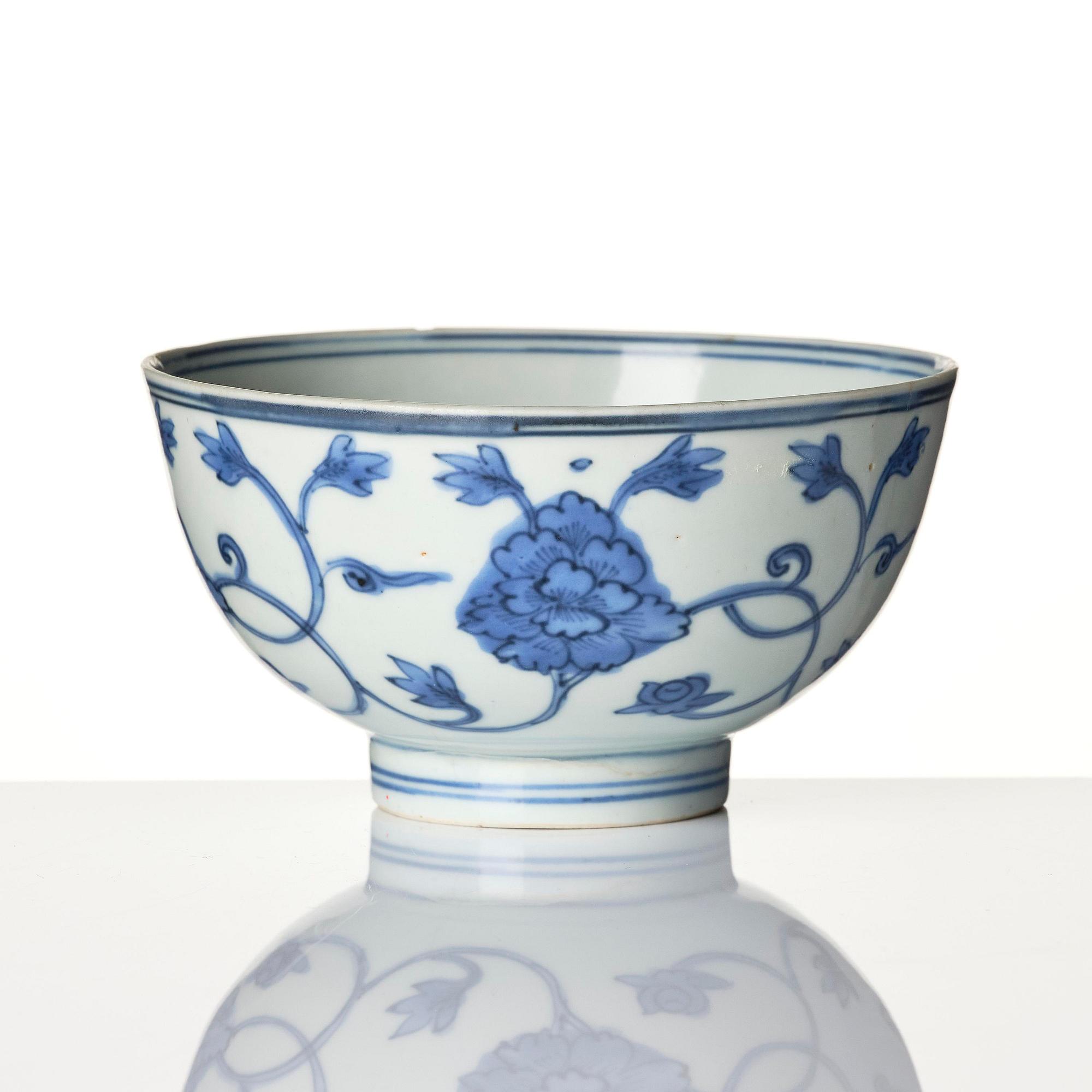 A blue and white 'floral' bowl and a dish, Ming dynasty, Jiajing (1522-1566).