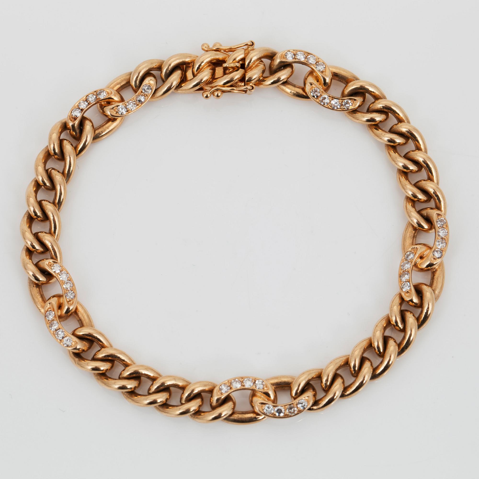 A brilliant-cut diamond bracelet. Total carat weight of diamonds circa 0.67 ct.