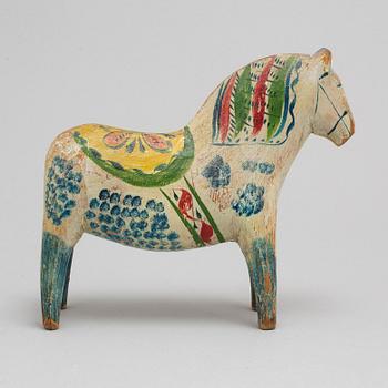 A Dala horse, painted pine, circa 1900.