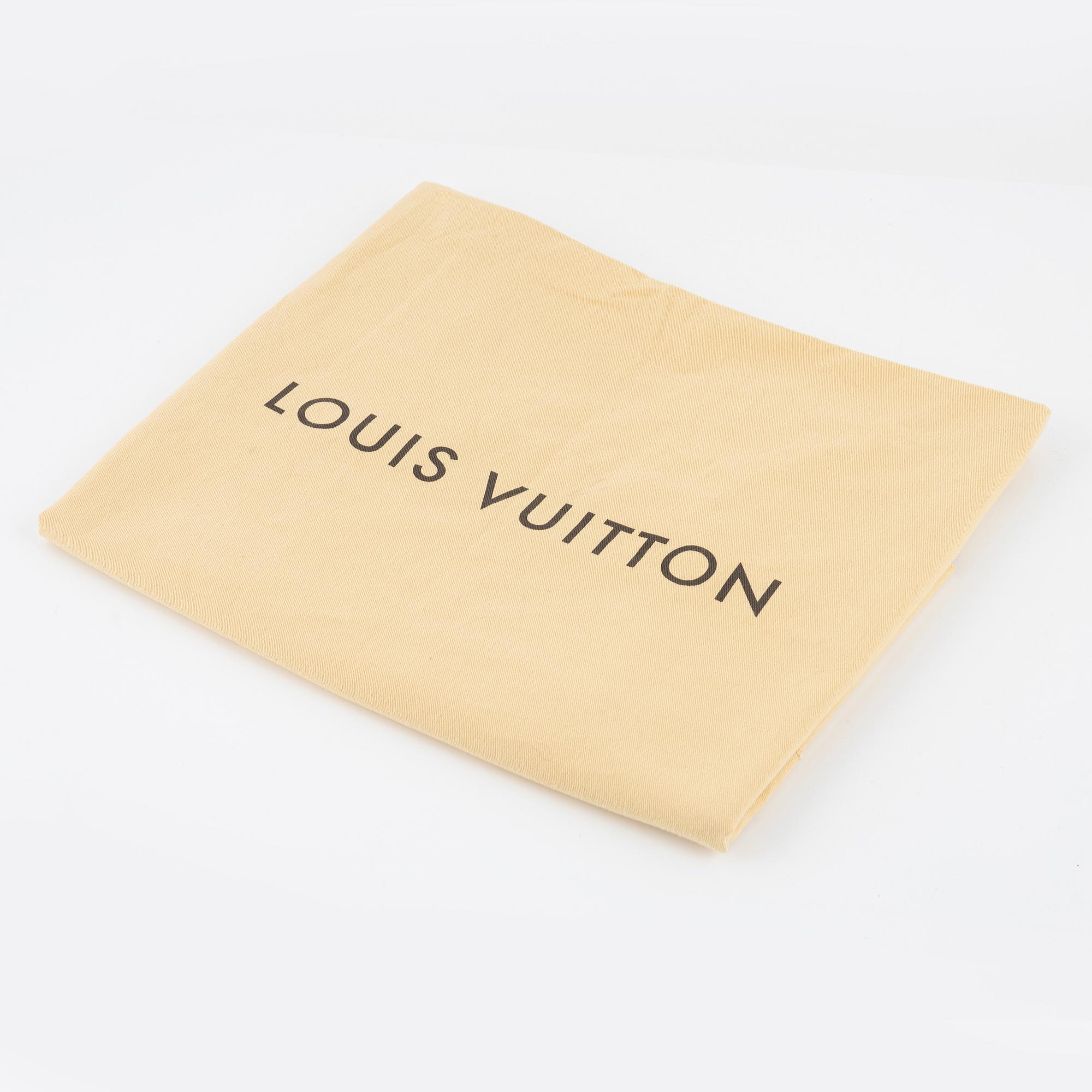 Louis Vuitton, a 'Monogram Denim Jacket', size 52.