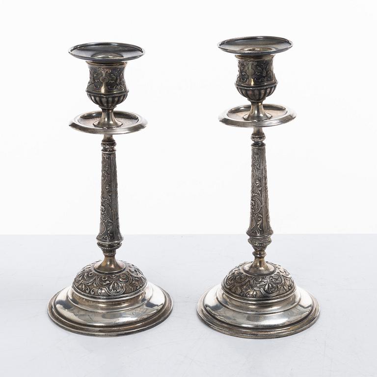 A pair of Swedish silver Renaissance-revival candlesticks, mark of CG Hallberg, Stockholm 1883.
