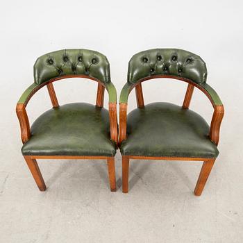 A pair of leather armchairs from the second half of the 20th century.