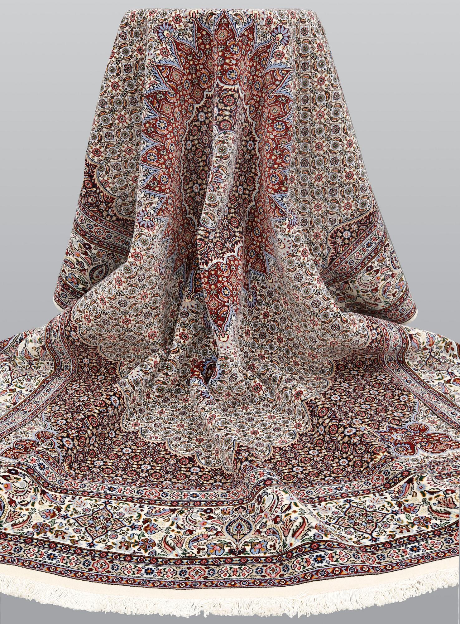 A part silk Moud carpet, approximately 350 x 252 cm.