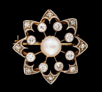 725. A gold, platinum, diamond and cultured pearl brooch.