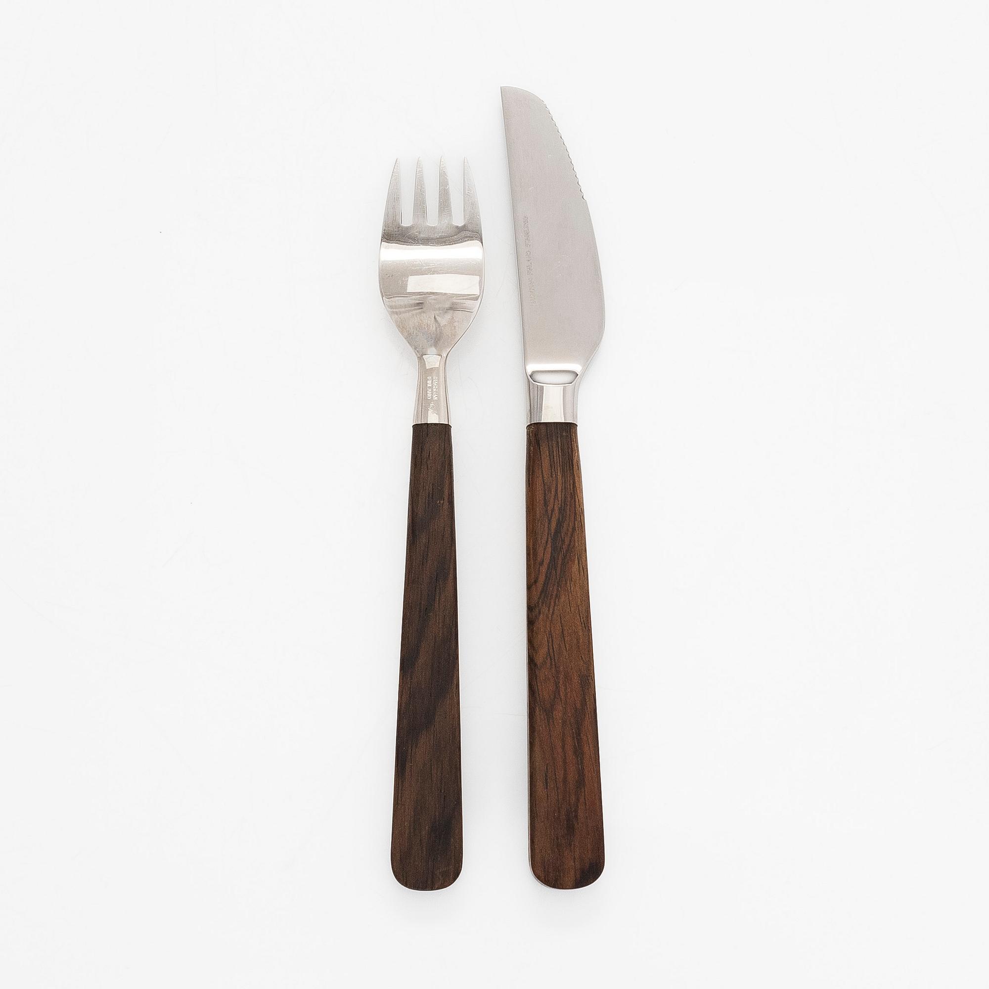 Bertel Gardberg, a 24-piece 'Lion de Luxe' cutlery set of rosewood and steel, Hackman, Finland 1960s.