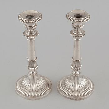 a pair of silver candlesticks, 1830.