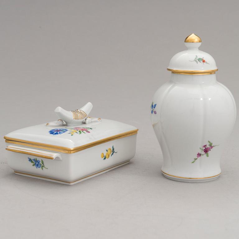 Two Meissen porcelain vases, a platter, an urn and a lidded box from the latter half of 20th century.