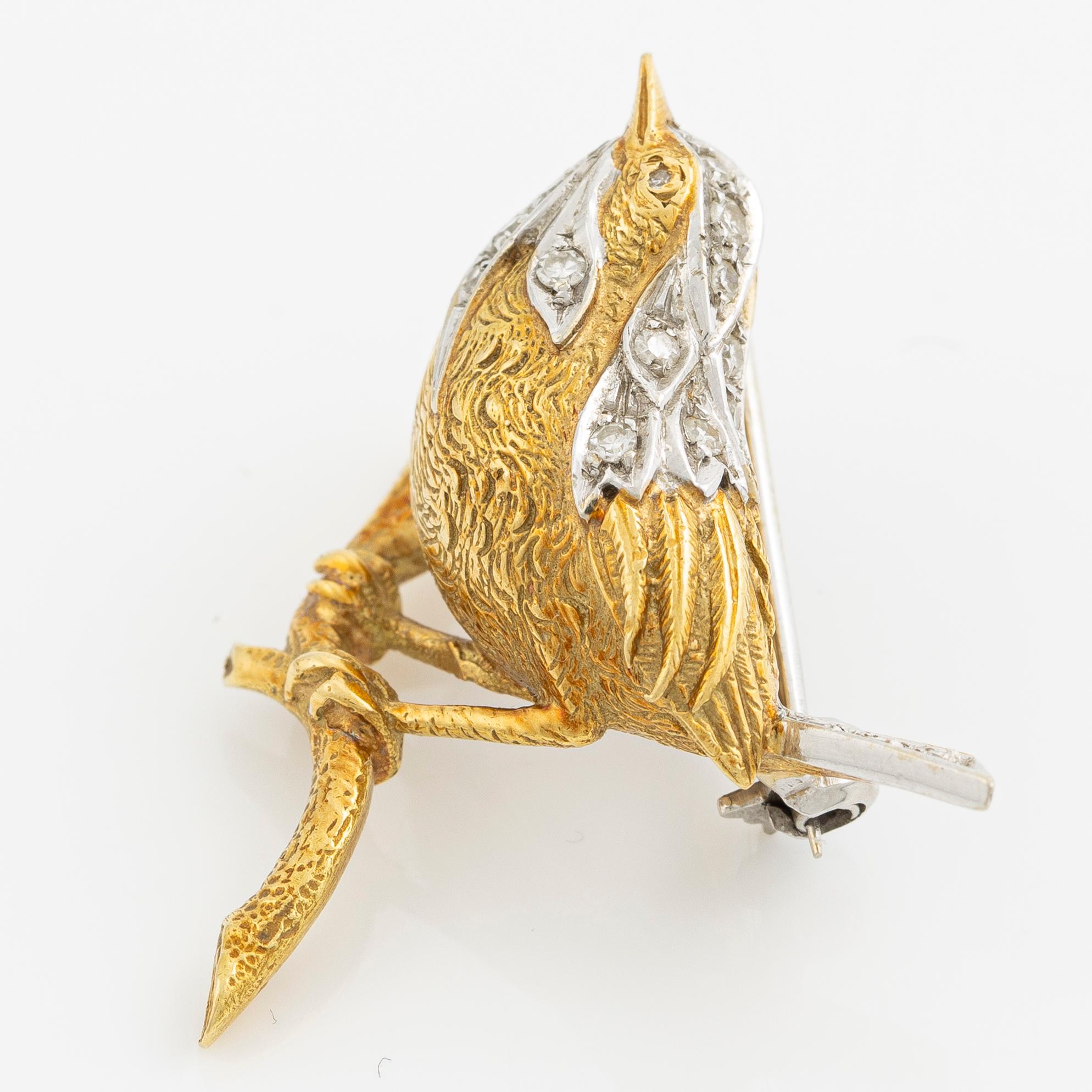 Brosch i form av en fågel 18K guld med åttkantslipade diamanter.