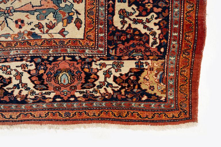 An Antique Sarouk carpet, West Persia, c. 353 x 260 cm.