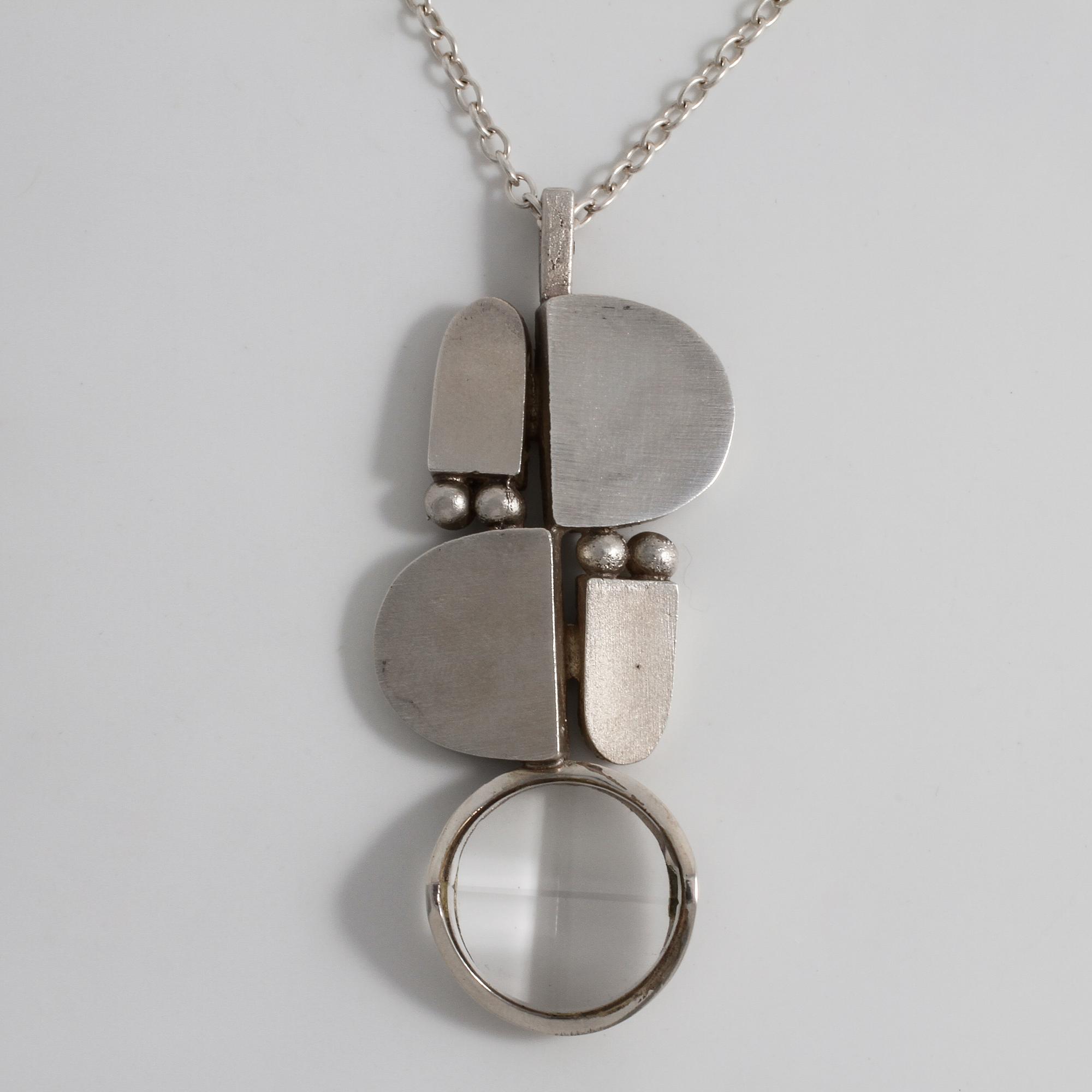 JORMA LAINE, Turku, Finland, 1973, a facet cut rock crystal pendant.