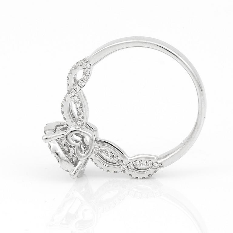 RING, vitguld 18K, briljantslipade diamanter totalt ca 0.71ct. Tot ca 3 gram.