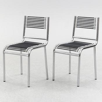 A pair of Rene Herbst chromium-plated, "Sandows" chairs, late 20th century.