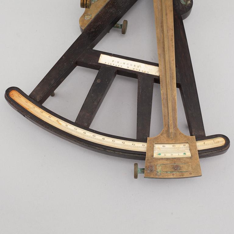 A turn of the century 1900 octant with case by F.M Moore.