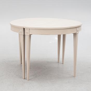 A Gustavian style dining table, mid-20th Century.